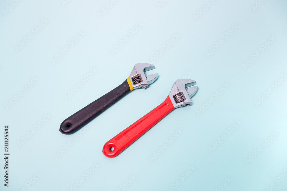 two wrench isolated on blue background. key isolate studio two wrench isolated on blue background. key isolate studio