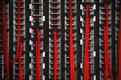 Close up of red wires on the back of the British military's Bombe machine, used to decode German Enigma machine encoded messages during world war 2