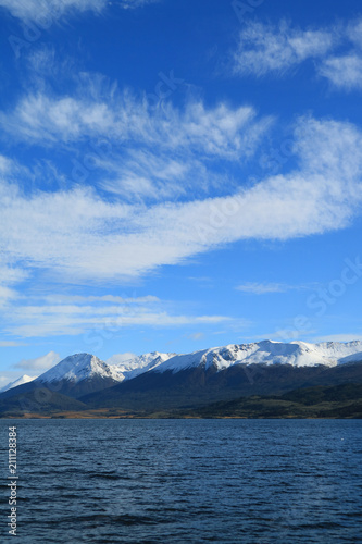 Snow capped mountain range view from the cruise ship on Beagle channel, Ushuaia, Tierra del Fuego, Argentina 