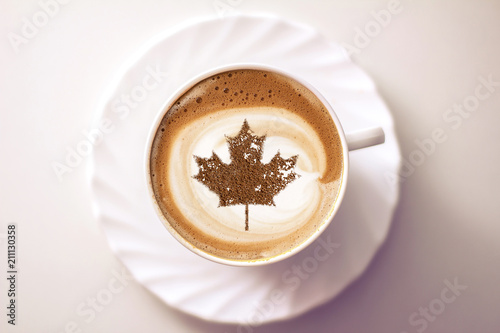 clover on a cup of coffee