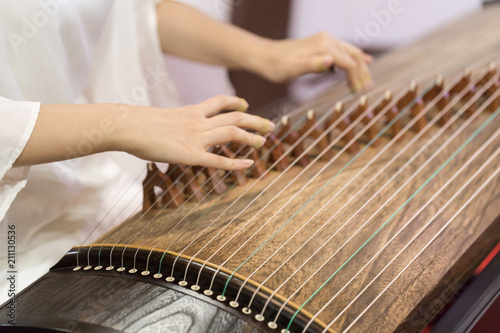 Playing the zither's moment