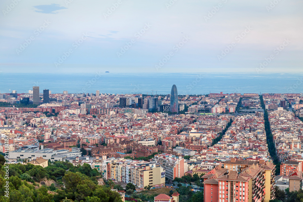 Barcelona, Spain. Panoramic view of the city towards the sea from the hill.