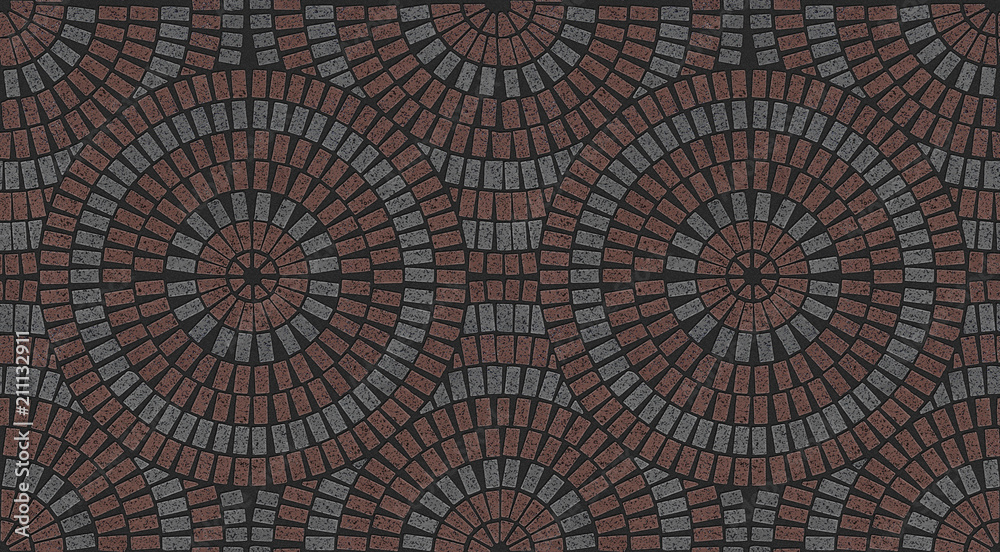 Brick laying radial patterns in patio paving