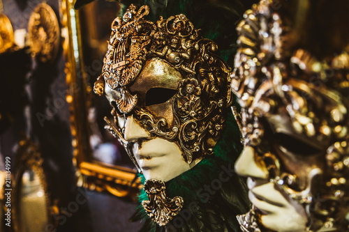 Golden and ornate venetian masks