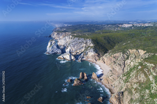 Aerial view of the beautiful Usra Beach near Sintra, Portugal; Concept for travel in Portugal and best travel destinations. photo