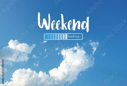 Weekend loading word on blue sky background photo