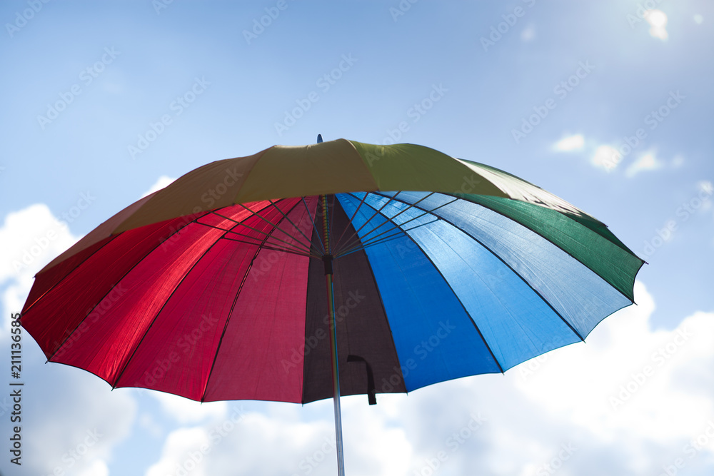 rainbow flag umbrella at pride parade