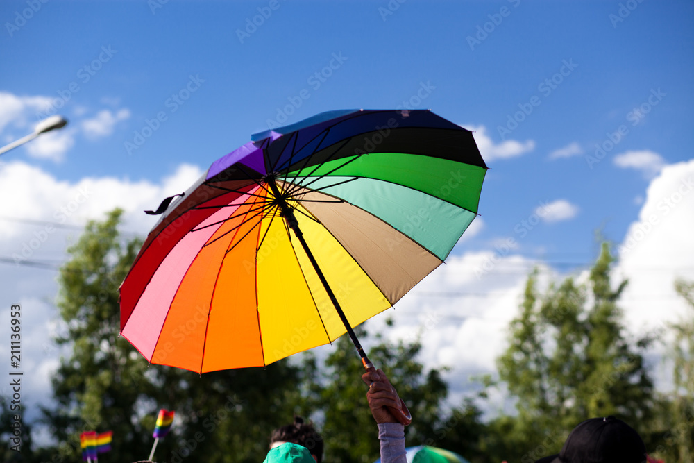 rainbow flag umbrella at pride parade