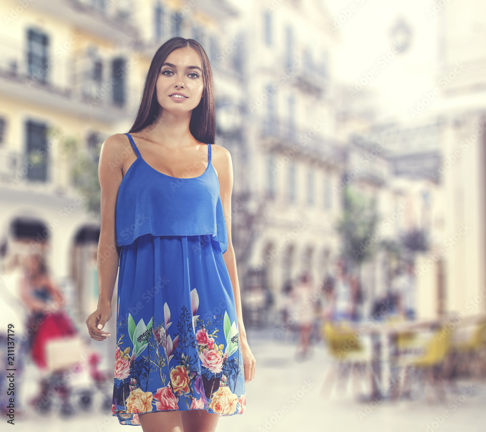 Summer time and slim young woman in city. Free space for your decoration Summer time and slim young woman in city. Free space for your decoration