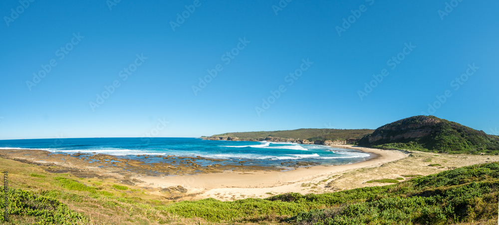 Panorama of a deserted beach, Catherine Hill Bay on the New South Wales Central Coast, Australia.