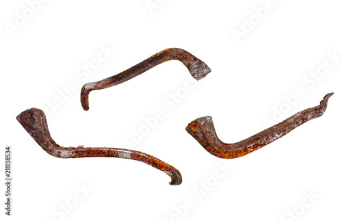 Very old rusted nails, isolated on white.