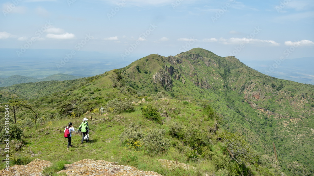 Hikers ascending Mount Ole Sekut in Kenya