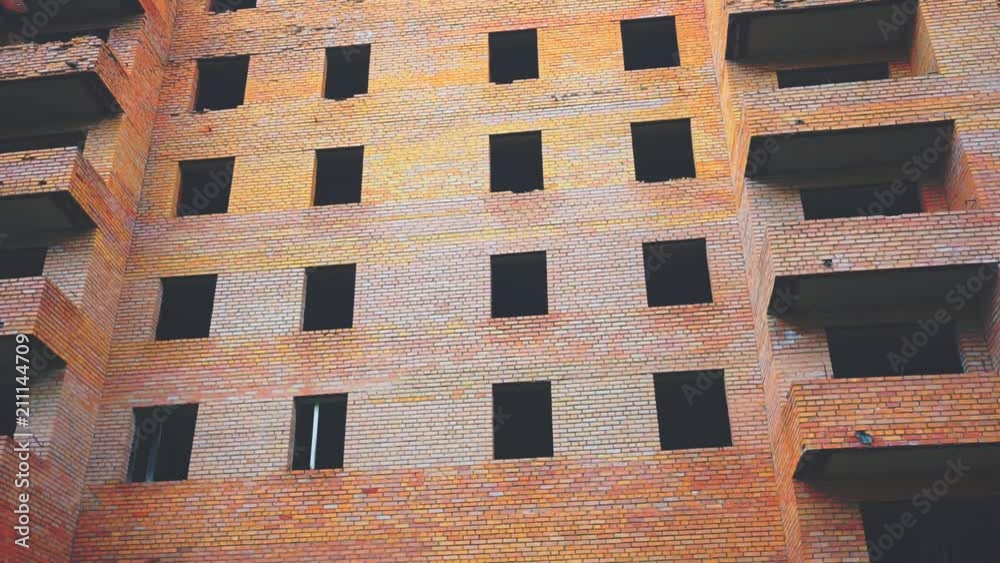 old unfinished dilapidated large building of brick old unfinished dilapidated large building of brick