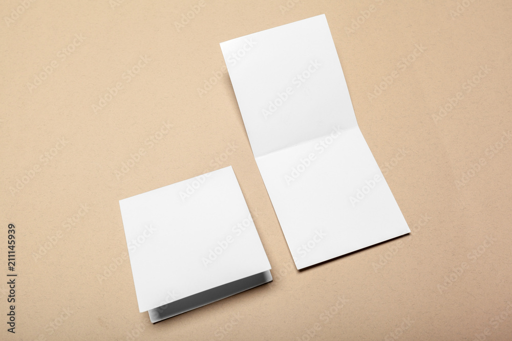 Blank paper pieces for mock up on a beige background Blank paper pieces for mock up on a beige background