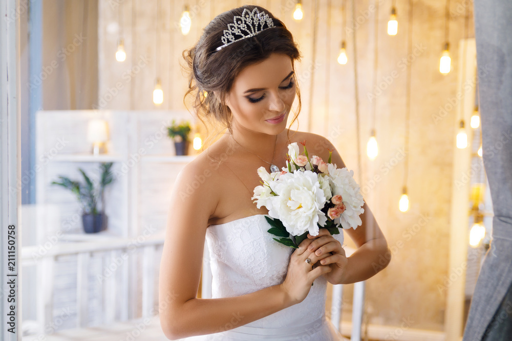 Happy and beautiful bride with bouquet of flowers Happy and beautiful bride with bouquet of flowers