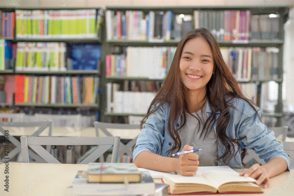 female students are searching for research papers. female students are searching for research papers.