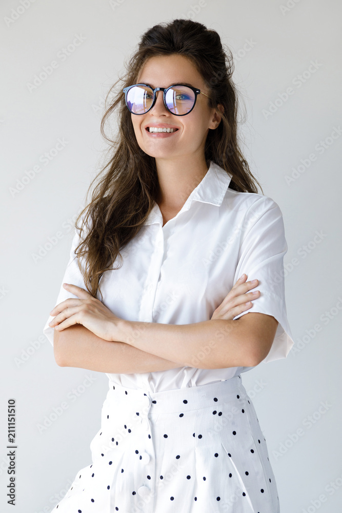 Young businesswoman wearing stylish clothes and eyeglasses Young businesswoman wearing stylish clothes and eyeglasses