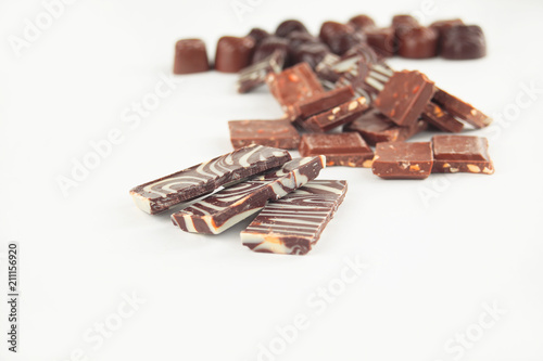 close up.a set of chocolate bars and sweets. isolated on white.photo with copy space