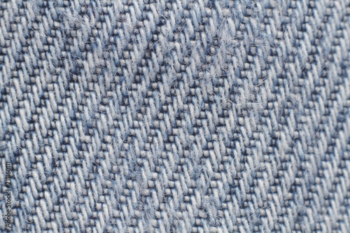 Texture of blue jeans as a background, macro mode