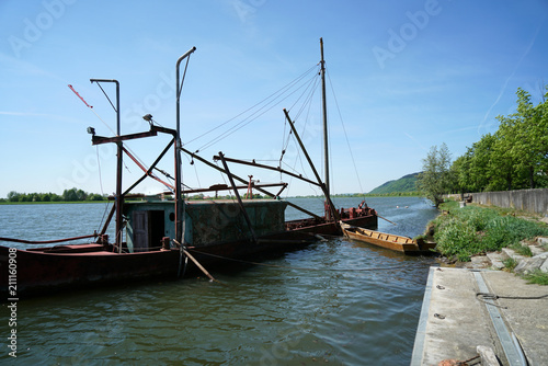 Fototapeta Naklejka Na Ścianę i Meble -  One of the last big professional fishermen ships on the Danube near Regensburg in Germany
