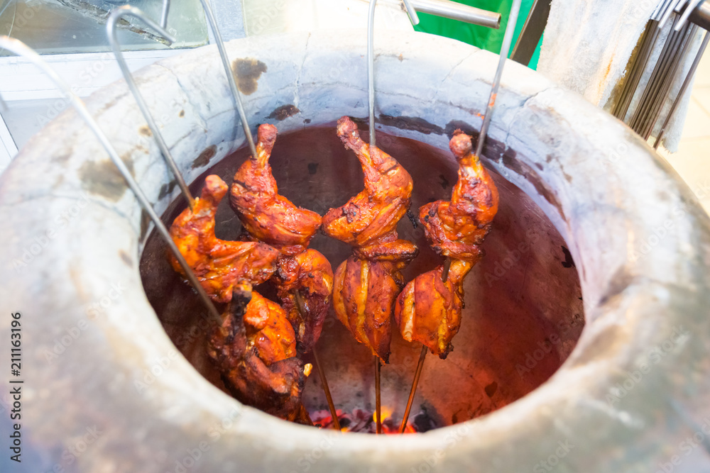 Malaysian tandoori chicken in oven Stock-bilde | Adobe Stock