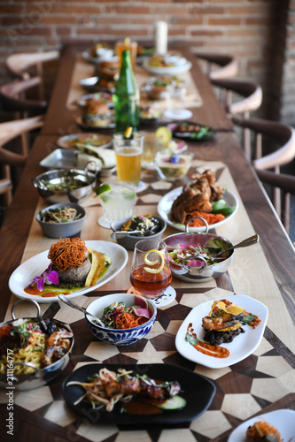 Restaurant table full of food