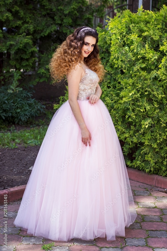 Girl in pink wedding dress