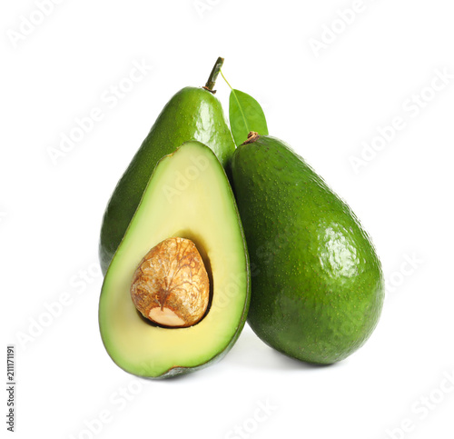 Ripe fresh avocados on white background