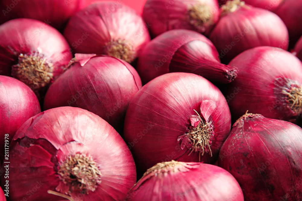 Ripe red onions as background