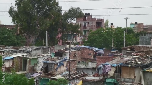 Zoom-Out: Slum of Delhi and Major Road photo