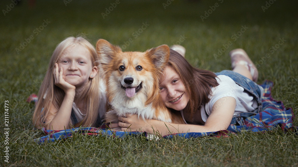 sisters and their dog