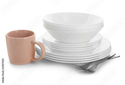 Different clean tableware on white background