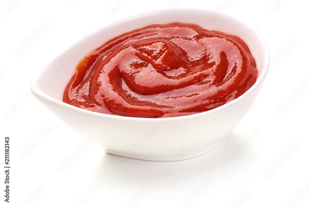 Bowl of ketchup or tomato sauce with herbs, isolated on white background. Bowl of ketchup or tomato sauce with herbs, isolated on white background.