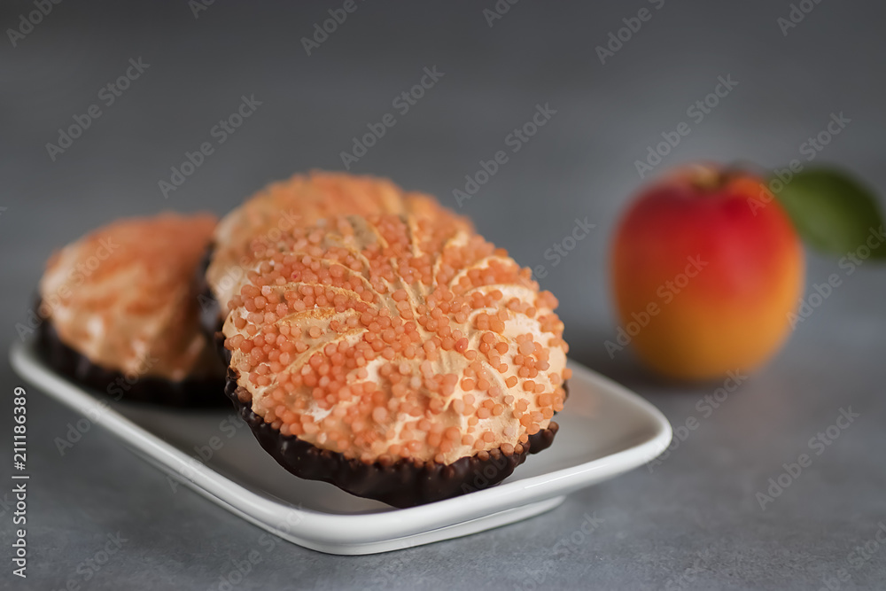 Apricot marshmallow on gray concrete background. Apricot marshmallow on gray concrete background.