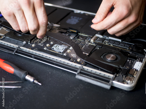 workshop repair the laptop close up master fix hardware