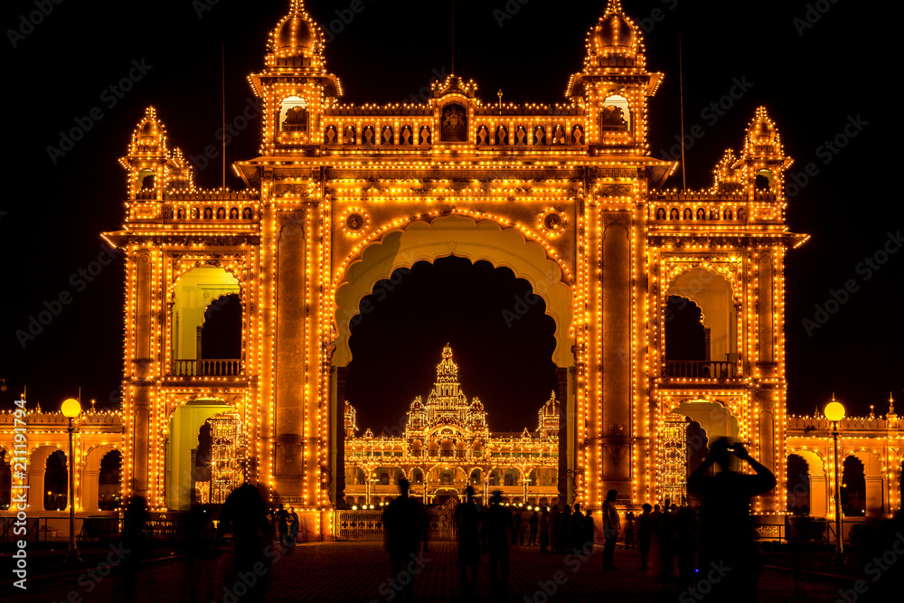 View of Mysore Palace entrance iluminated at night, also known as Ambavilas Palace, Karnataka, India