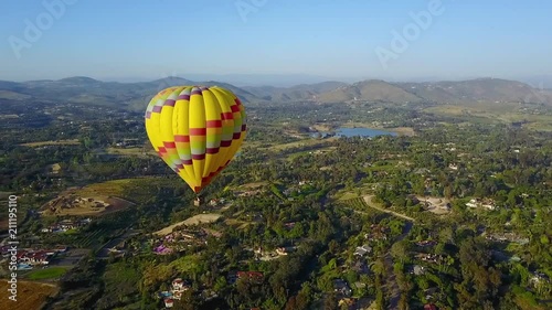 Close Aerial of Yellow Hot Air Balloon photo