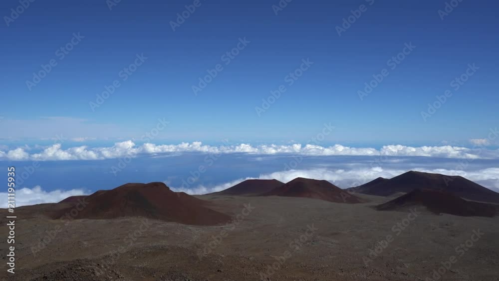 volcanic barren landscape over the clouds volcanic barren landscape over the clouds