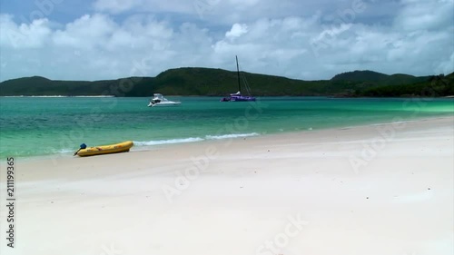 Boats by the Shore of a Secluded Island photo