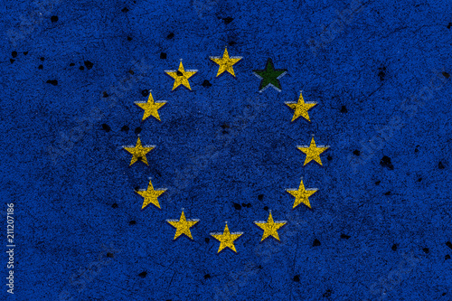 Flag of European Union with one star missing painted on rough concrete wall with holes/UK Brexit concept photo