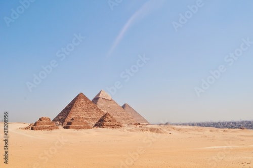 Perfect shot of the Egyptian pyramids under the sun in Giza  Egypt.