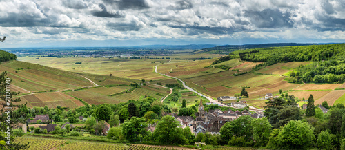 Panoramic view of a typical village in Burgundy, surrounded by vineyards photo