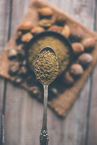 Indian ayurvedic Triphala churan or trifala powder is an ancient medicine for bowel movement or indigestion problems. Selective focus photo