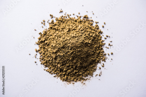 Indian ayurvedic Triphala churan or trifala powder is an ancient medicine for bowel movement or indigestion problems. Selective focus photo