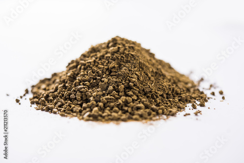 Indian ayurvedic Triphala churan or trifala powder is an ancient medicine for bowel movement or indigestion problems. Selective focus photo
