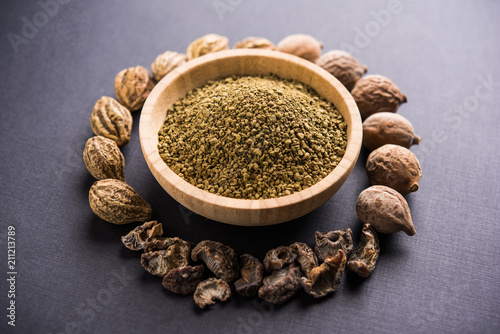 Indian ayurvedic Triphala churan or trifala powder is an ancient medicine for bowel movement or indigestion problems. Selective focus photo