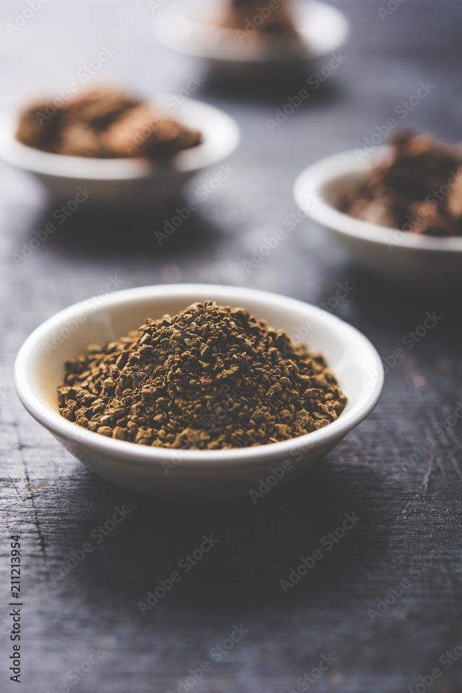 Indian ayurvedic Triphala churan or trifala powder is an ancient medicine for bowel movement or indigestion problems. Selective focus Indian ayurvedic Triphala churan or trifala powder is an ancient medicine for bowel movement or indigestion problems. Selective focus