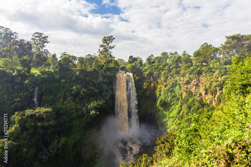 Landscape with a waterfall surrounded by wild forest. Kenya  Africa