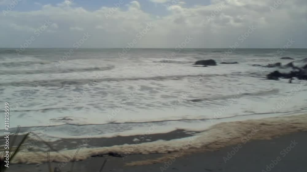 Sweeping View of a Sandy Beach with Bluffs Sweeping View of a Sandy Beach with Bluffs