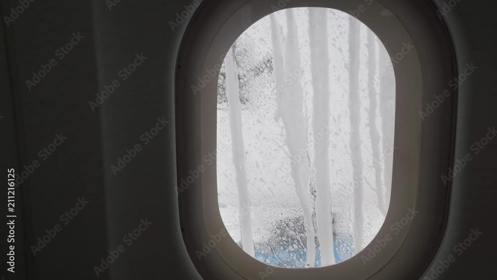 Treatment of the aircraft from icing before flight stock footage video Treatment of the aircraft from icing before flight stock footage video